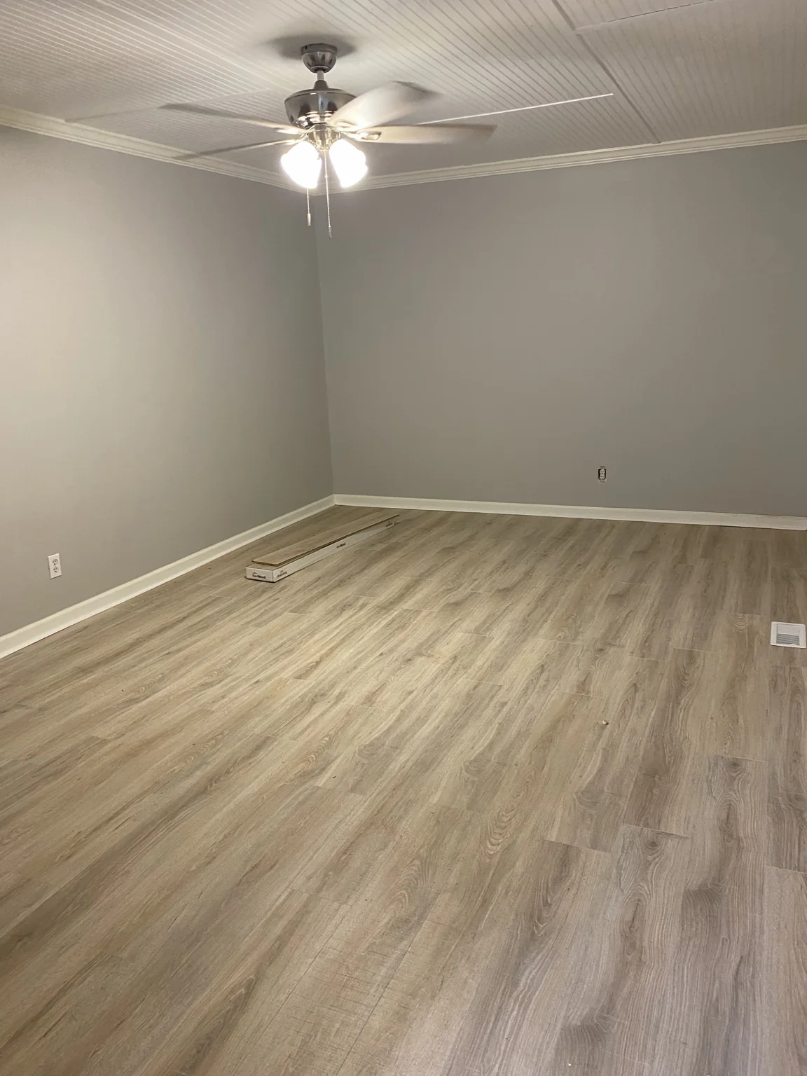 Plank flooring across an open room